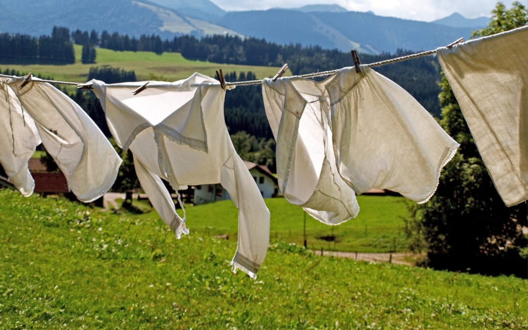 clothes drying on a washing line in a field